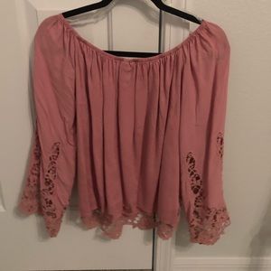 Looks better in person. Never worn-doesn’t suit me